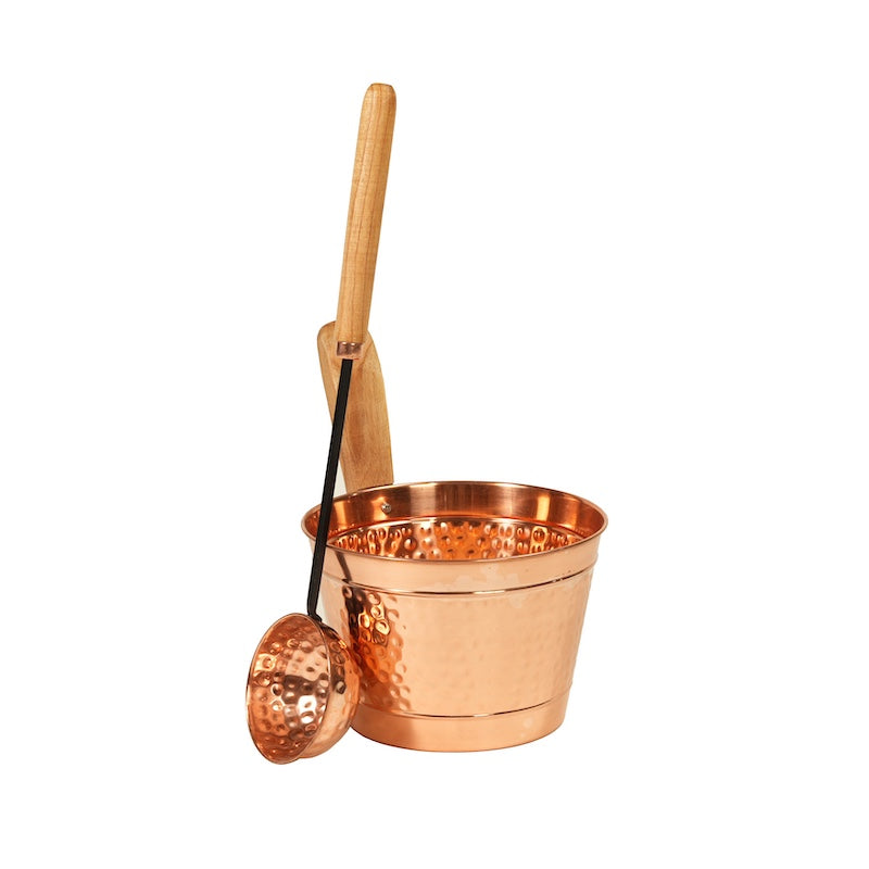 A polished copper sauna bucket and ladle set with wooden handles.