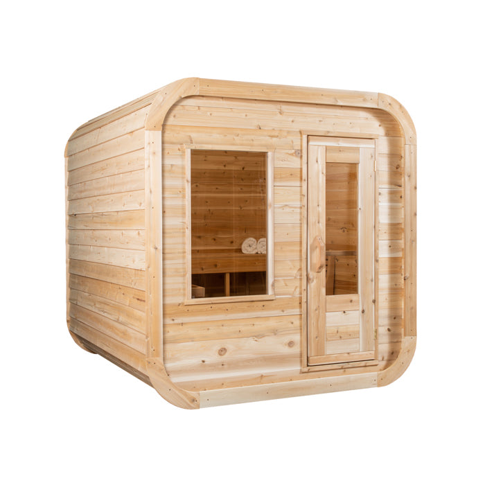 A modern, outdoor, cedar cube sauna with a large window and a glass door.