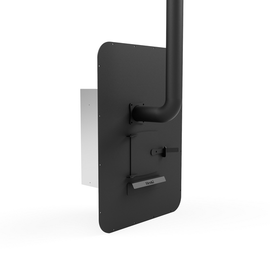 Back of Henki H1 wood burning sauna stove heater with a stainless steel heat shield, chimney, and ash tray.