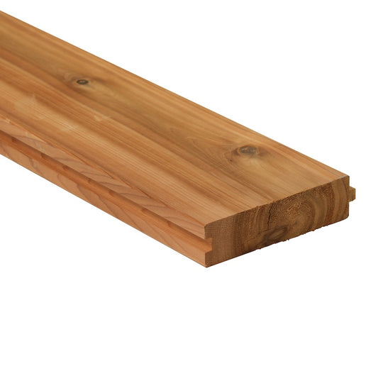 A single knotty cedar tongue and groove 2x6 plank with used for structural sauna walls.