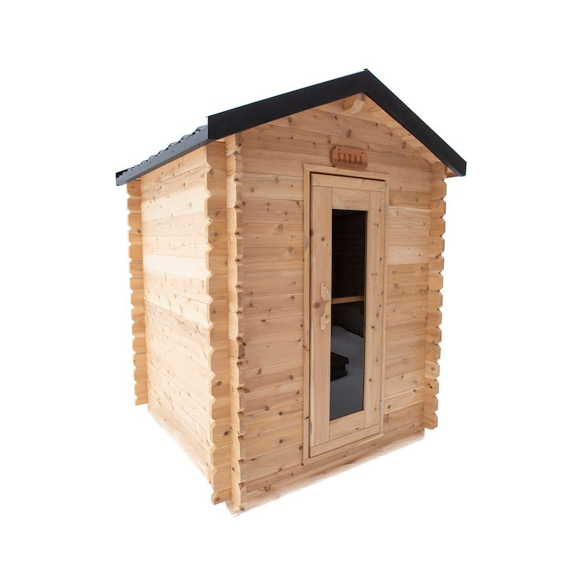 A small, outdoor, cedar cabin sauna made with a glass door and a black metal roof.