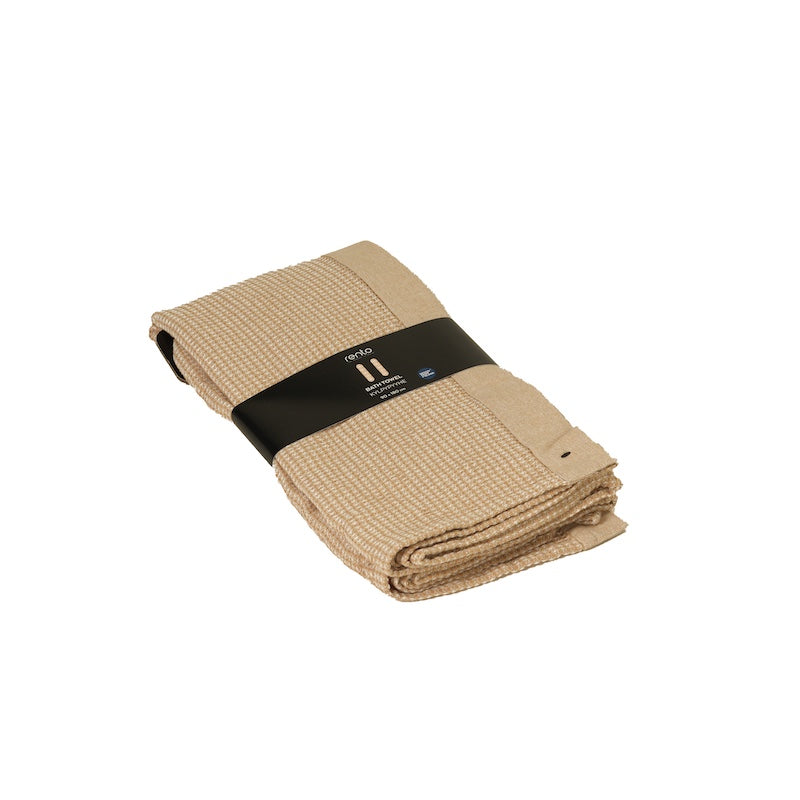 A packaged, beige, waffle knit sauna bath towel.