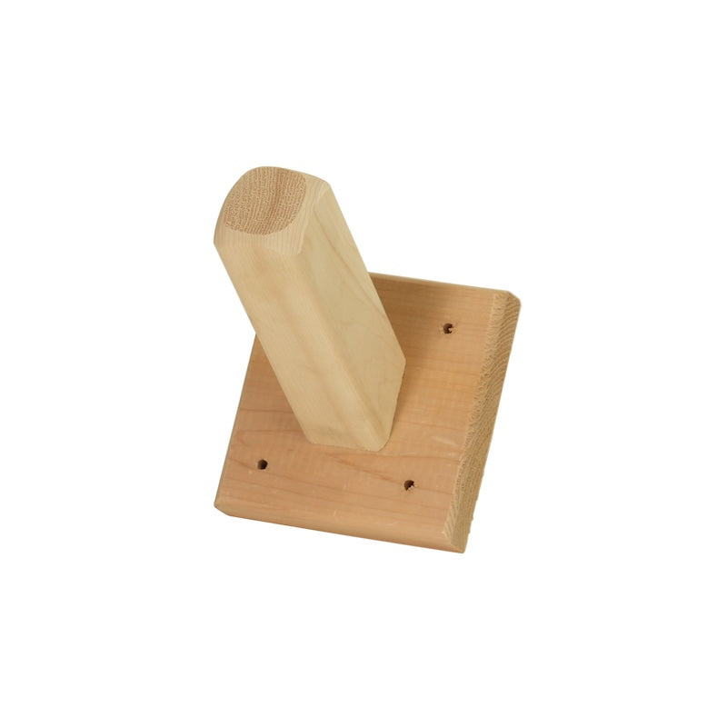 A single-peg cedar towel and robe hook used for saunas.