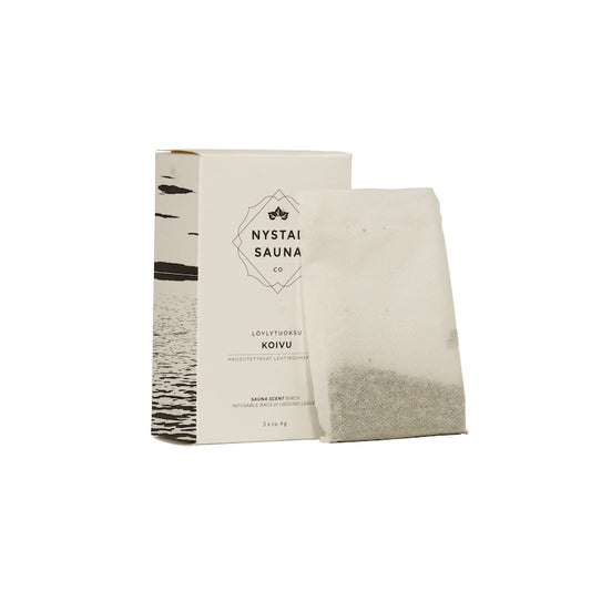 A box and bag of dried birch leaves used to infuse sauna water with essential oils and essence for aroma.