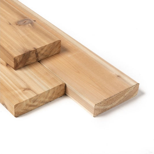 Three cedar 2x6 planks used for sauna construction.