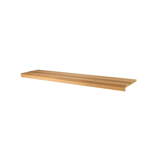 A pre-fabricated, slatted cedar bench for a sauna. 