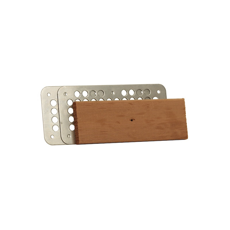 A twisting cedar vent cover with two vent grates designed for airflow control in saunas. 