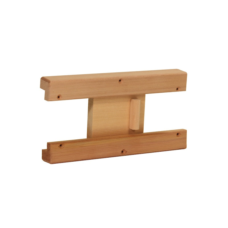 A sliding cedar vent cover designed for airflow control in saunas.