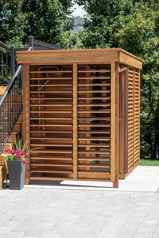 The left side of a Custom Pure Cube Sauna in a Toronto backyard.