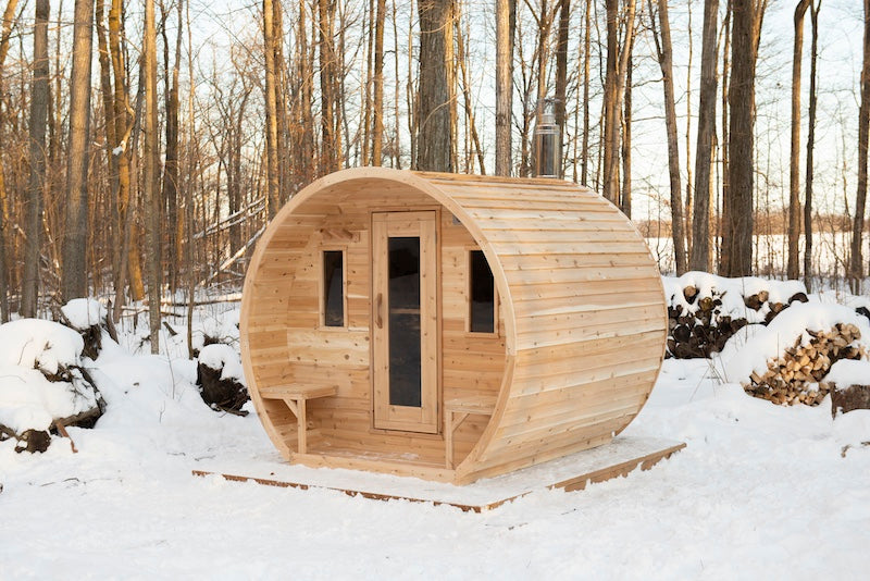 Henki's Modern Barrel Sauna in the snow.