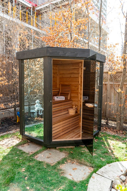 A Pure Cube Trinity Sauna in a backyard in Toronto.